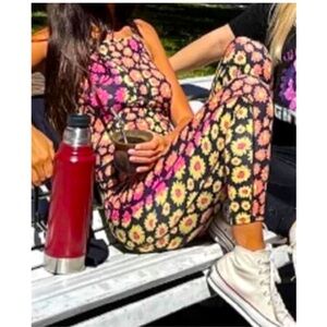 Free People Movement side to side daisy onesie